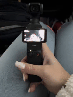 The camera held in one hand